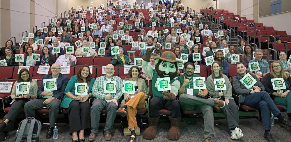 AI Summit group photo with Norm