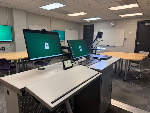Fretwell 114 Lecture station with two monitors, a keyboard and a document camera.