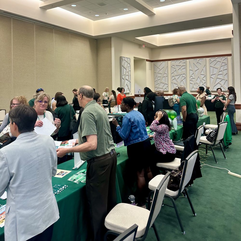faculty and staff gathering at new faculty orientation in 2026